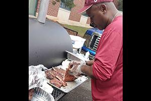 alum grills at Homecoming tailgate