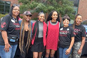 a group of female alumni at homecoming